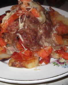 Запеченная мясная котлета с гарниром Вулкан