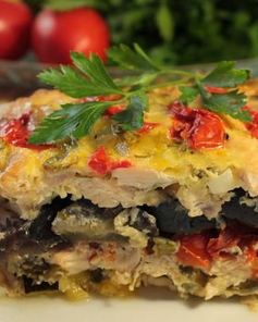 Куриное филе под баклажанами и сыром в духовке