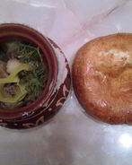 Мясо в горшочках с тестом