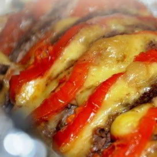 Рецепт мясо, запеченное с сыром и помидорами