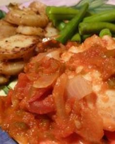 Рыба в томатном соусе с овощами