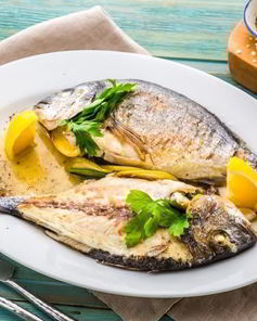 Дорада, маринованная с травами