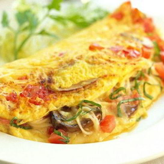 Рецепт сытного омлета с грибами, помидорами и сыром